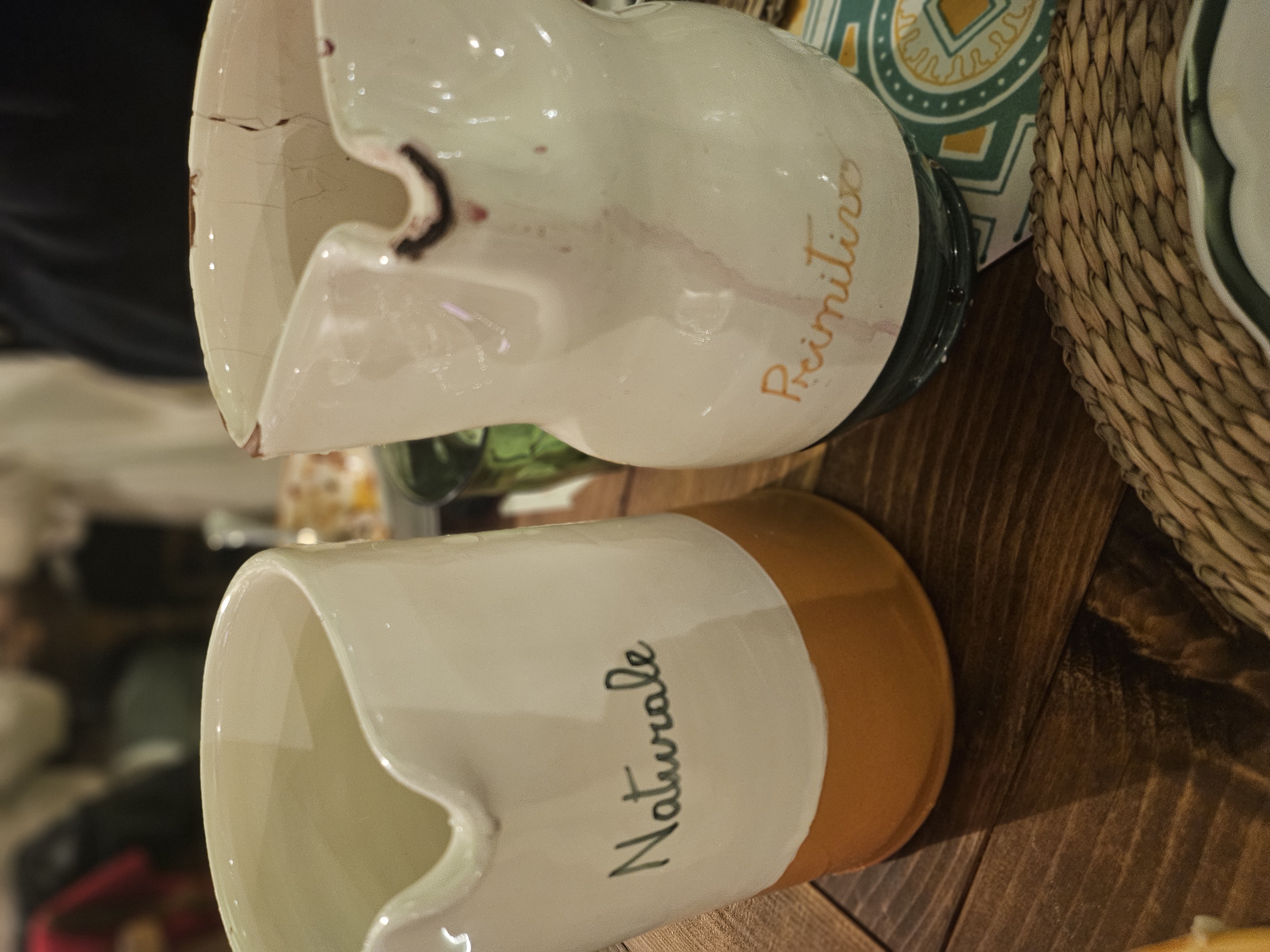 One-litre carafe of Italian house Primitivo red wine on the dinner table