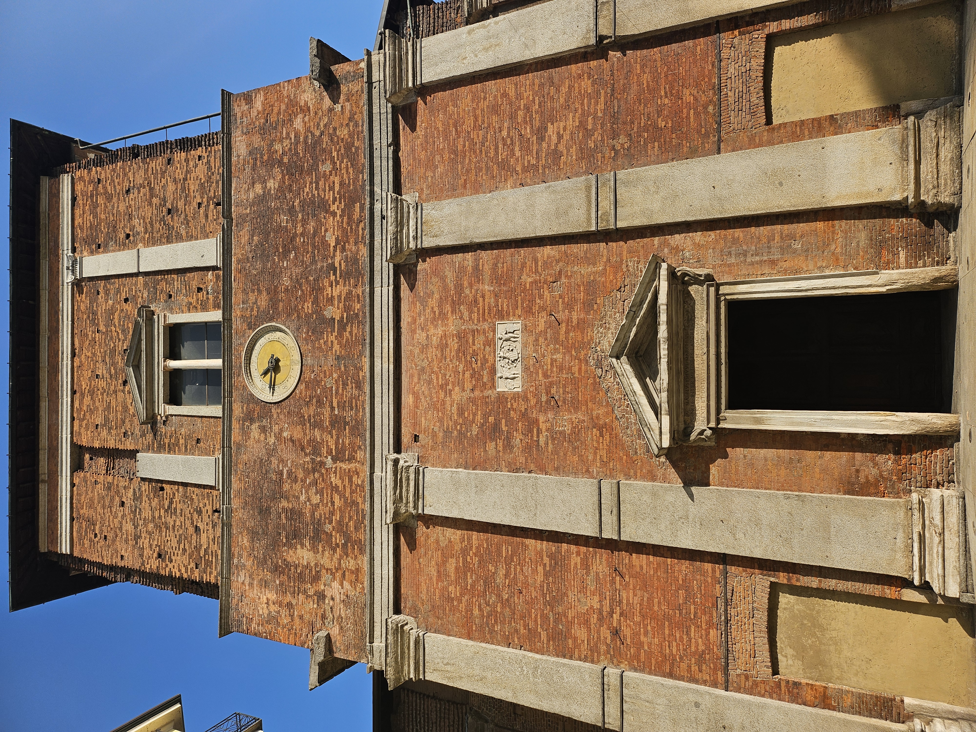 Ancient Roman brickwork and stone architecture of 4th-century church in Milan