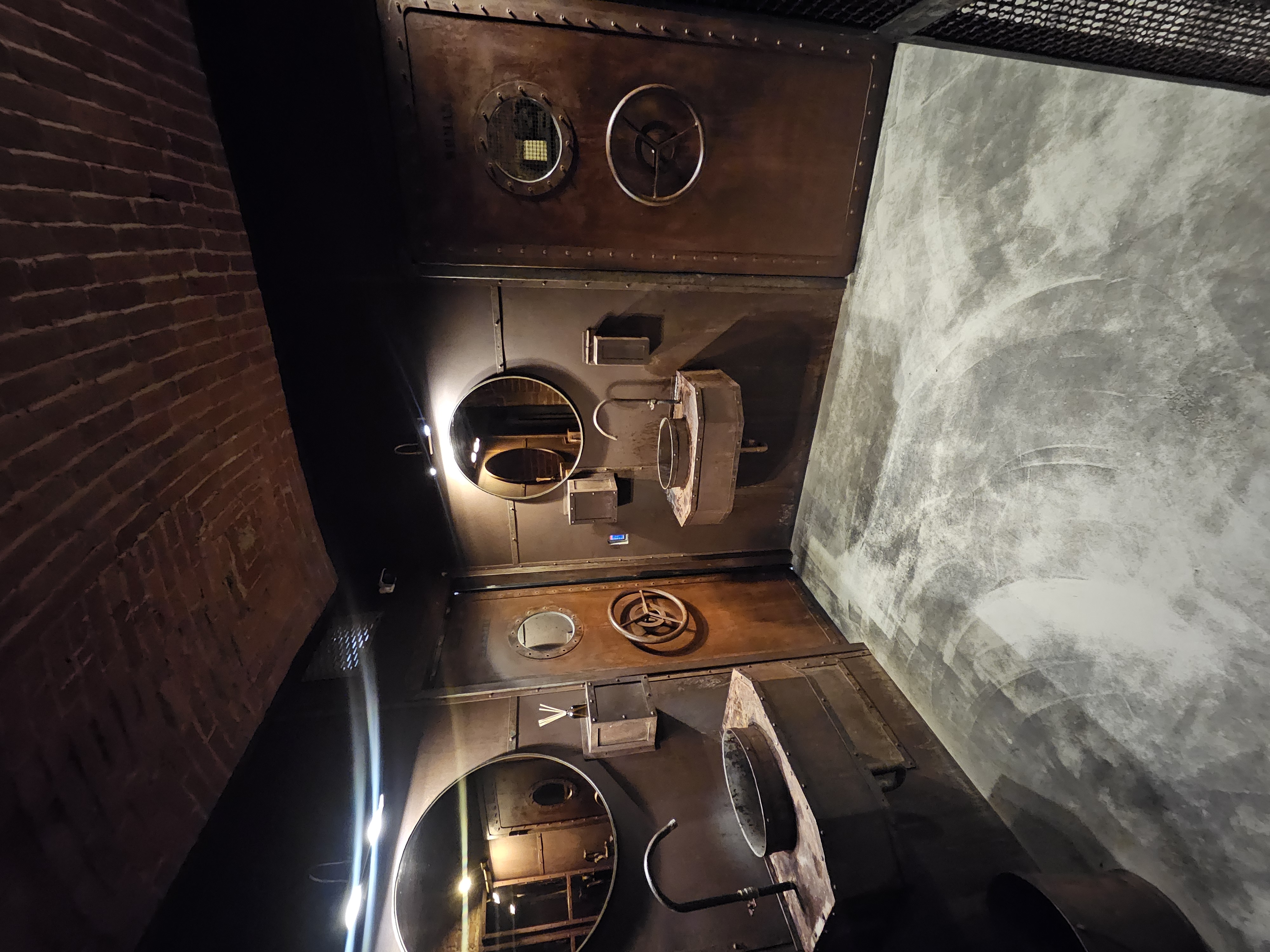 Quirky ship-head nautical bathroom aboard La Chiatta floating restaurant