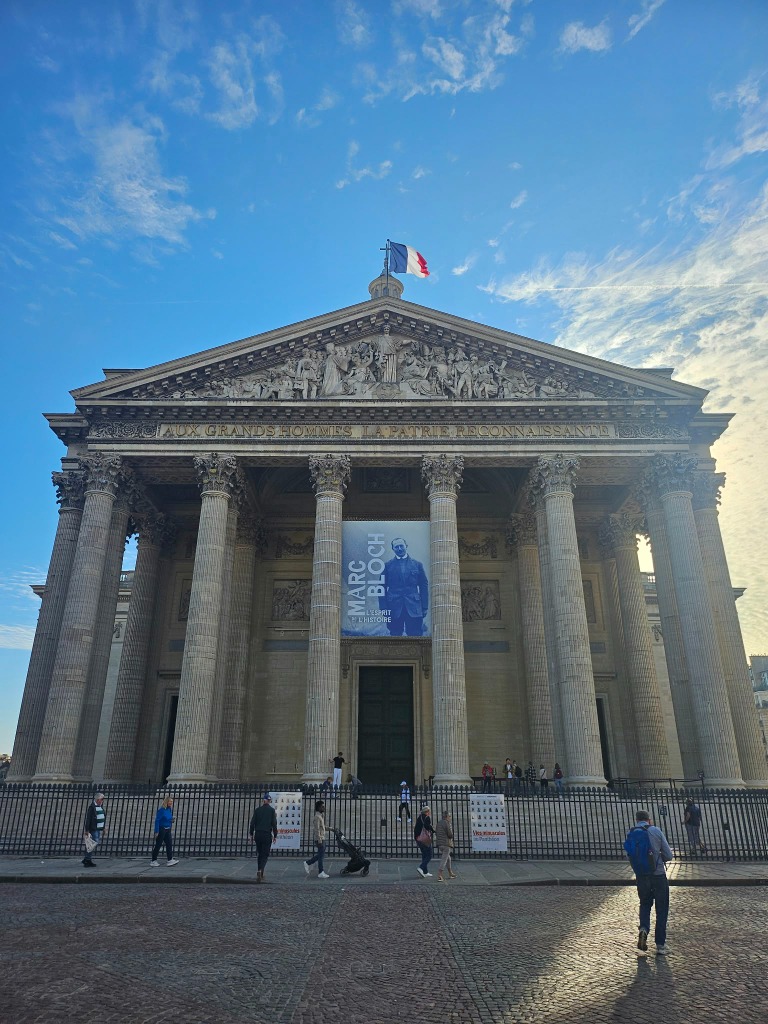 The Panthéon in Paris with the French Tricolour flag flying above the columns